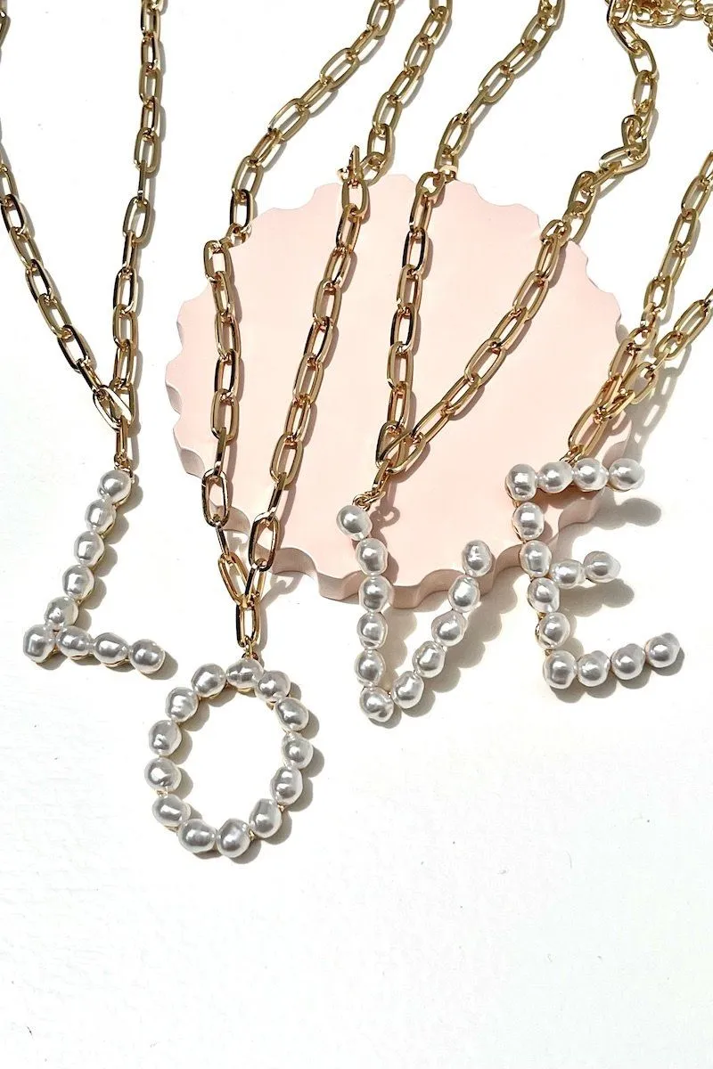 Pearl Initial Necklace sold by Mulberry and Grand