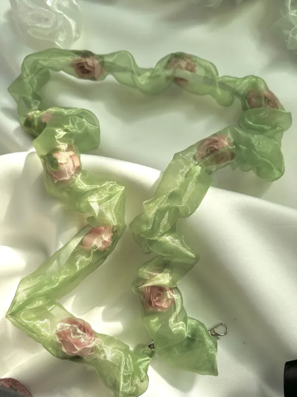 The Rose Filled Phone Strap sold by Room Shop