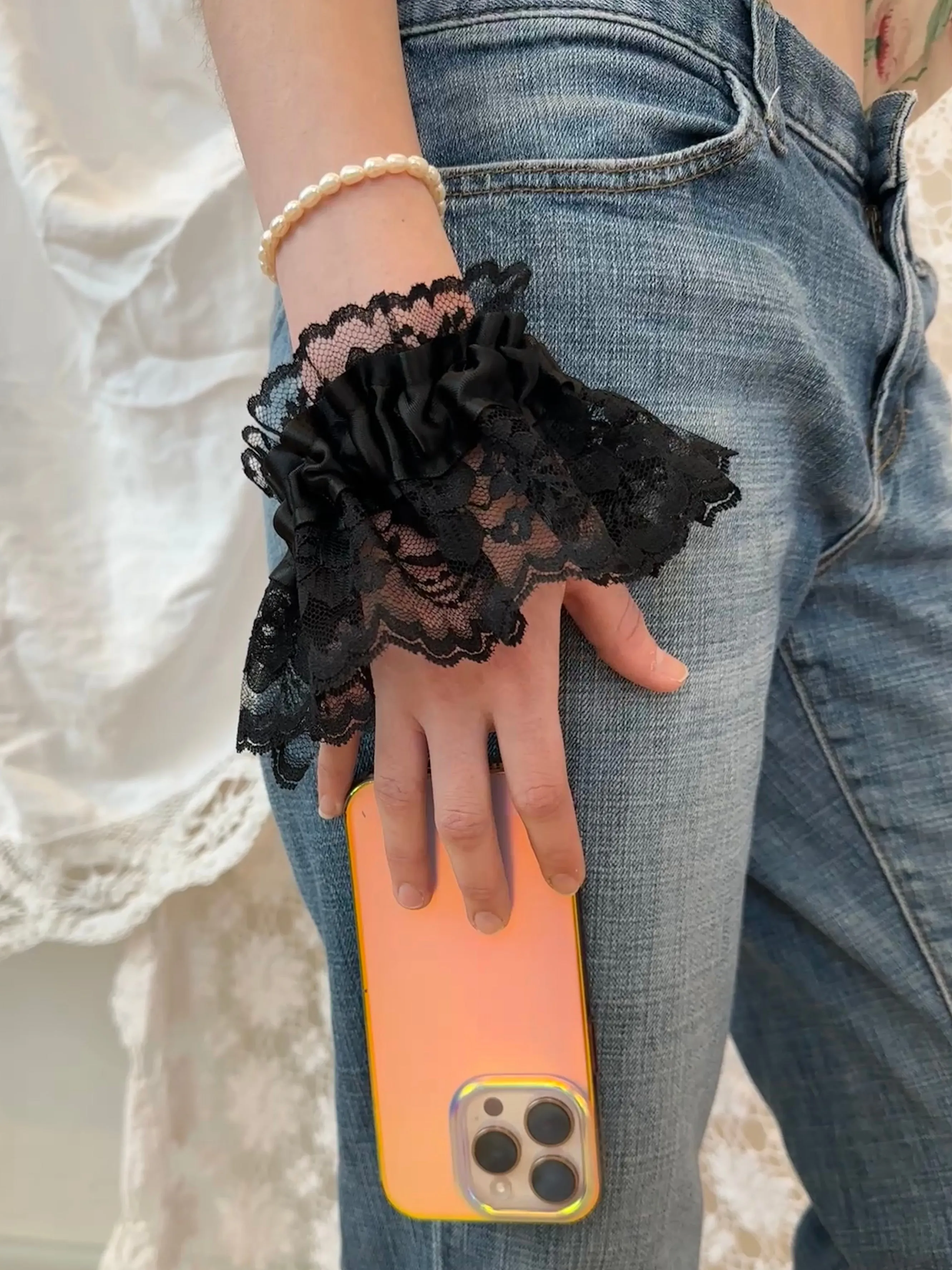 Lace Cuff Phone Wristlet sold by Room Shop