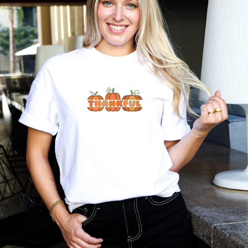 ''Thankful Pumpkins Trio" Tee: Gratitude in Every Stitch sold by Anna-Kaci