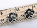 Scaled Threatening Scary Skull Element Earrings sold by Anna-Kaci