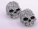 Scaled Threatening Scary Skull Element Earrings sold by Anna-Kaci