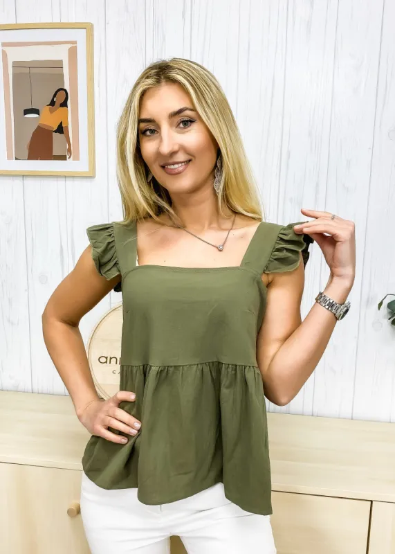 Ruffle Peplum Light Top sold by Anna-Kaci