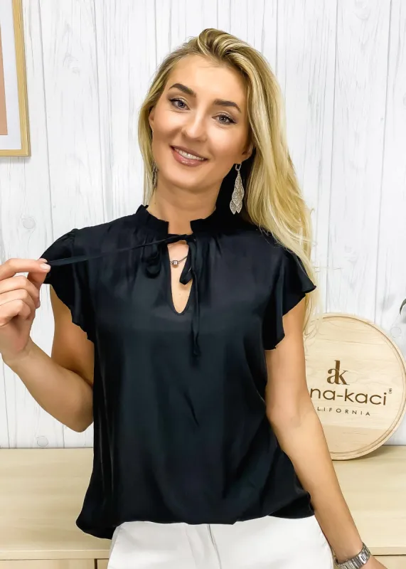 Tie Neck Flutter Sleeve Blouse sold by Anna-Kaci