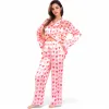 Anna-Kaci Women's Pink Heart Print Pajama Set with Button-Up Long Sleeve Top and Relaxed Fit Pants sold by Anna-Kaci