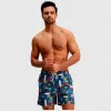 Anna-Kaci Men's Elastic Waist Swim Trunks with Colorblock Palm Tree Print and Adjustable Drawstring sold by Anna-Kaci