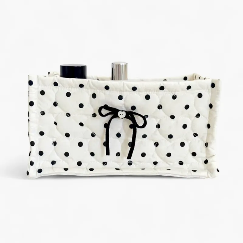 Anna-Kaci Quilted Polka Dot Storage Basket with Bow Accent and Soft Fabric Design sold by Anna-Kaci