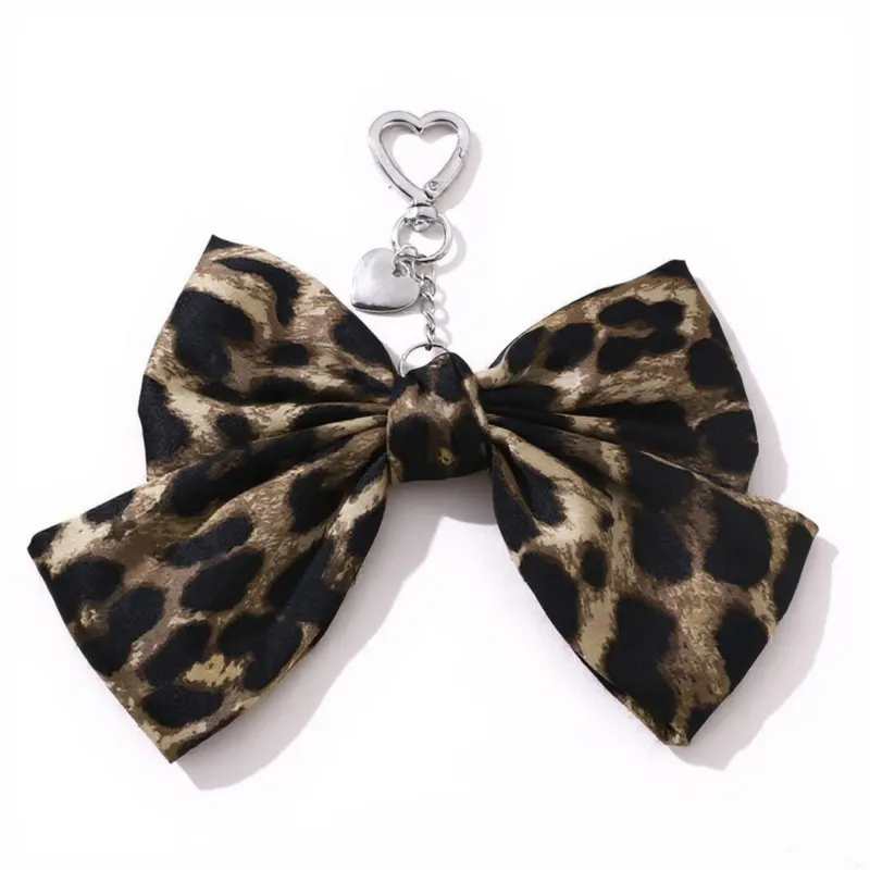 Anna-Kaci Leopard Print Fabric Bow Keychain with Silver Heart Clip Charm sold by Anna-Kaci