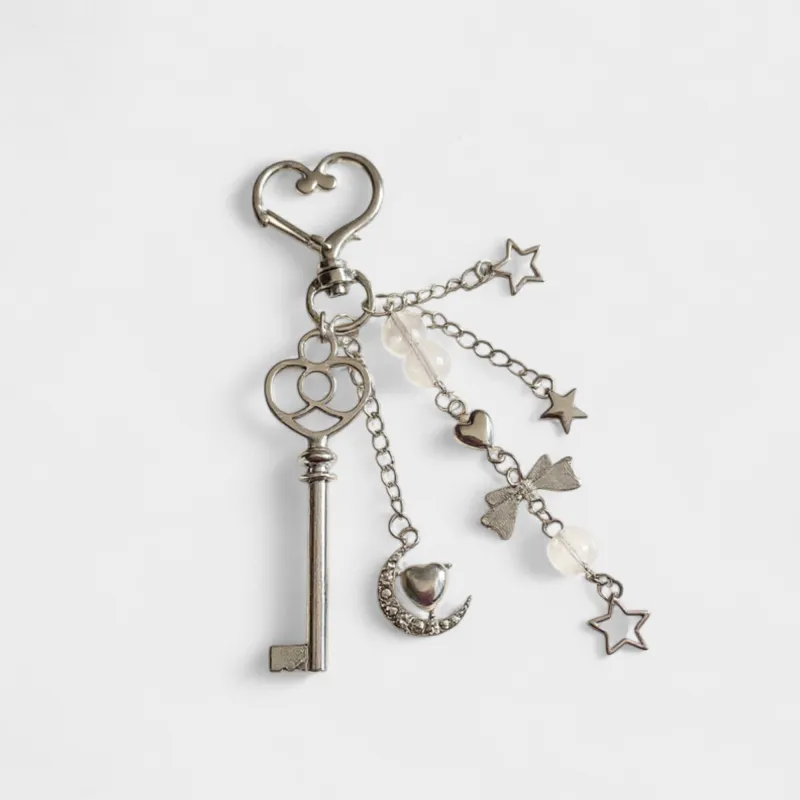 Anna-Kaci Silver Heart Keychain with Moon, Star, and Bow Charms sold by Anna-Kaci