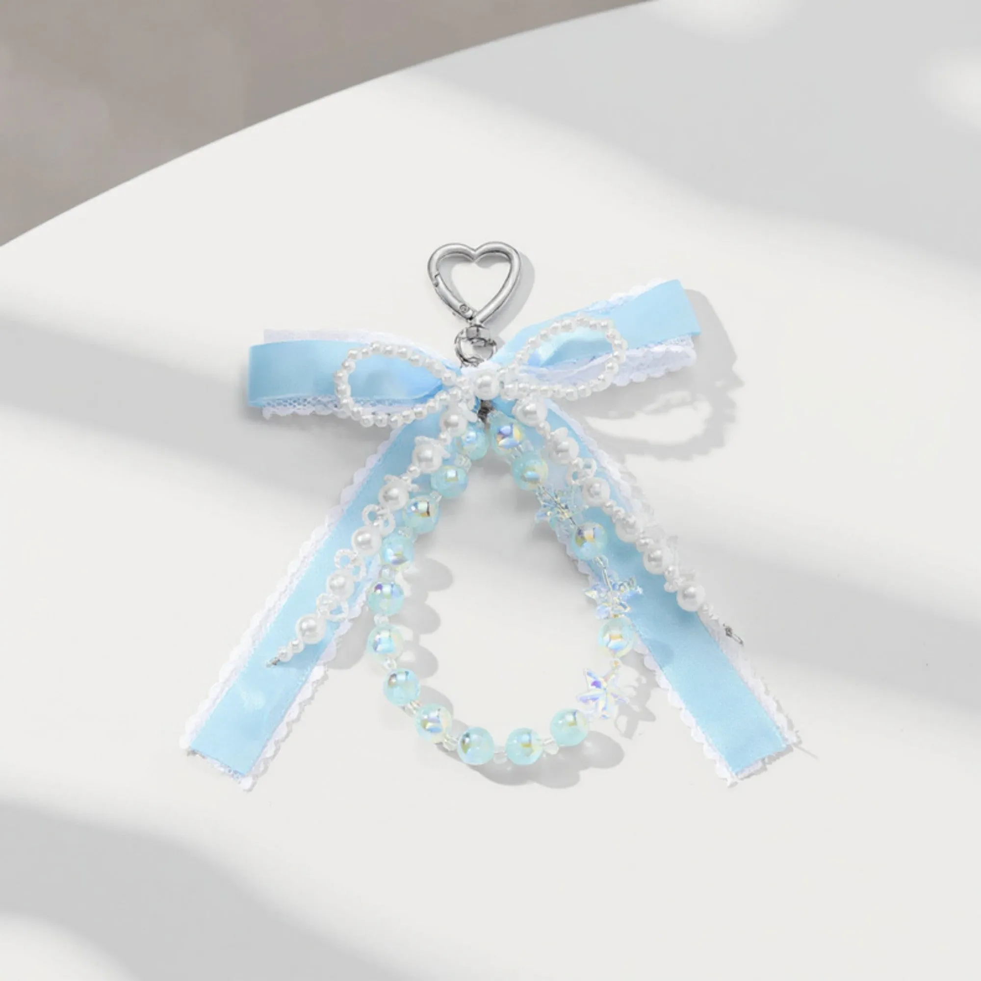 Anna-Kaci Blue Ribbon Keychain with Pearl Bow and Iridescent Beaded Star Charms sold by Anna-Kaci product image thumbnail 2