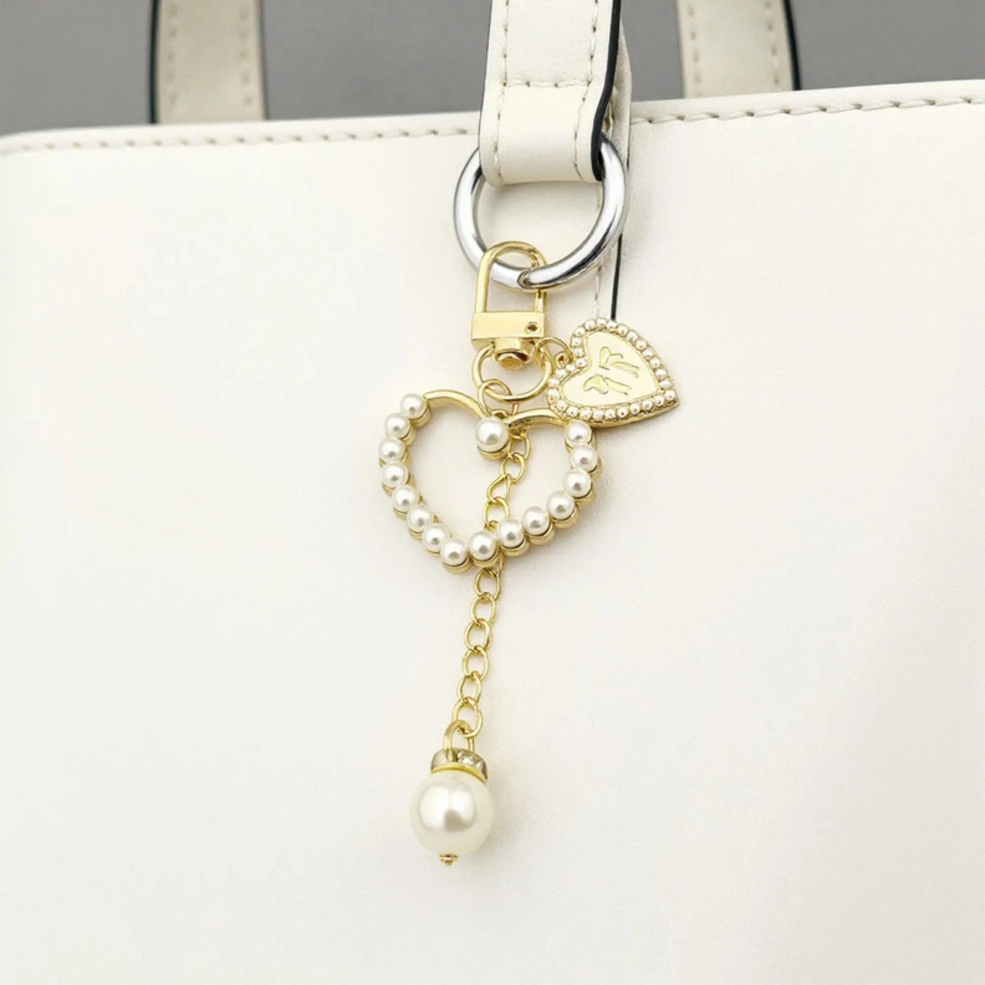 Anna-Kaci 3-Piece Pearl Heart Charm Keychain with Gold Chain and Enamel Accent sold by Anna-Kaci product image thumbnail 4