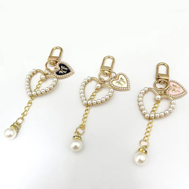 Anna-Kaci 3-Piece Pearl Heart Charm Keychain with Gold Chain and Enamel Accent sold by Anna-Kaci
