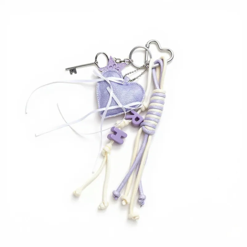 Anna-Kaci Heart Charm Keychain with Ribbon Tassels and Alphabet Beads sold by Anna-Kaci