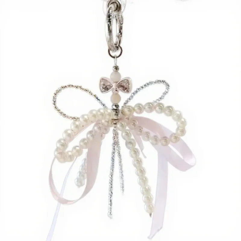 Anna-Kaci Pearl and Ribbon Bow Angel Keychain Charm with Crystal Details sold by Anna-Kaci