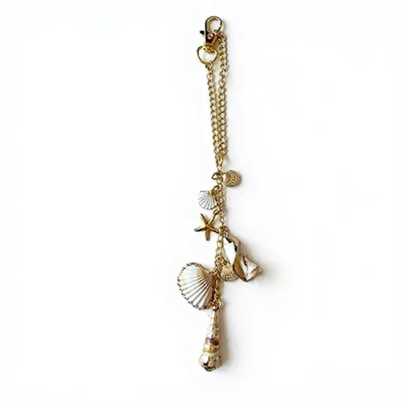 Anna-Kaci Gold Tone Seashell and Starfish Charm Keychain with Nautical Accents sold by Anna-Kaci