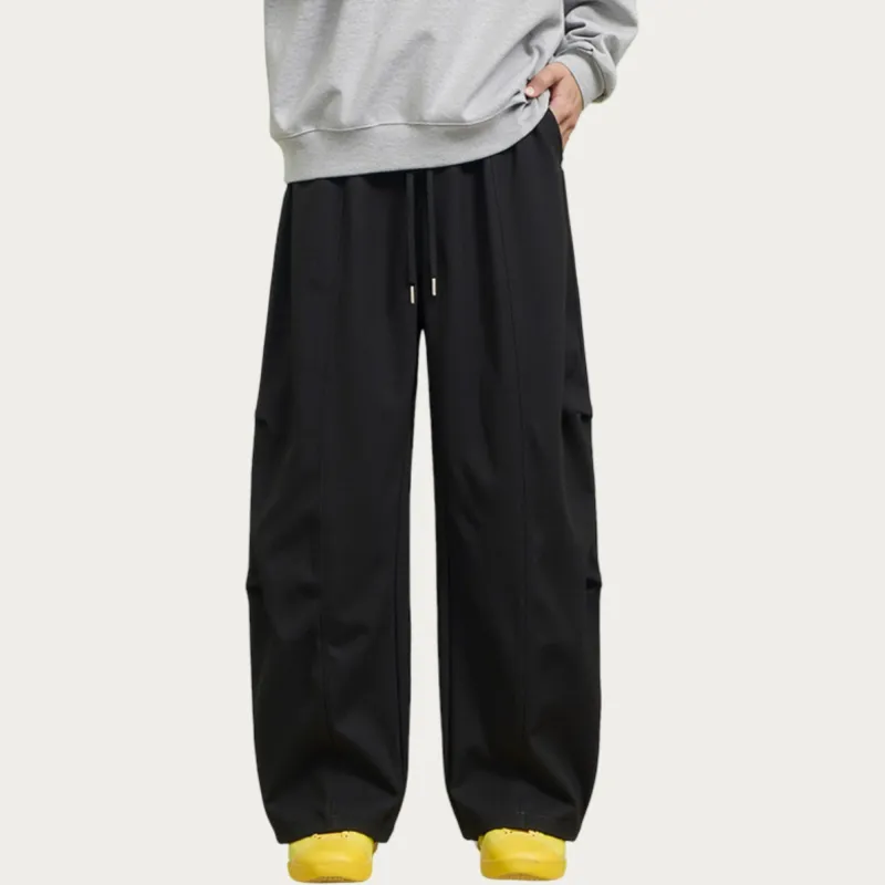 Anna-Kaci Men's Wide Leg Drawstring Pants with Relaxed Fit and Clean Seam Detailing sold by Anna-Kaci