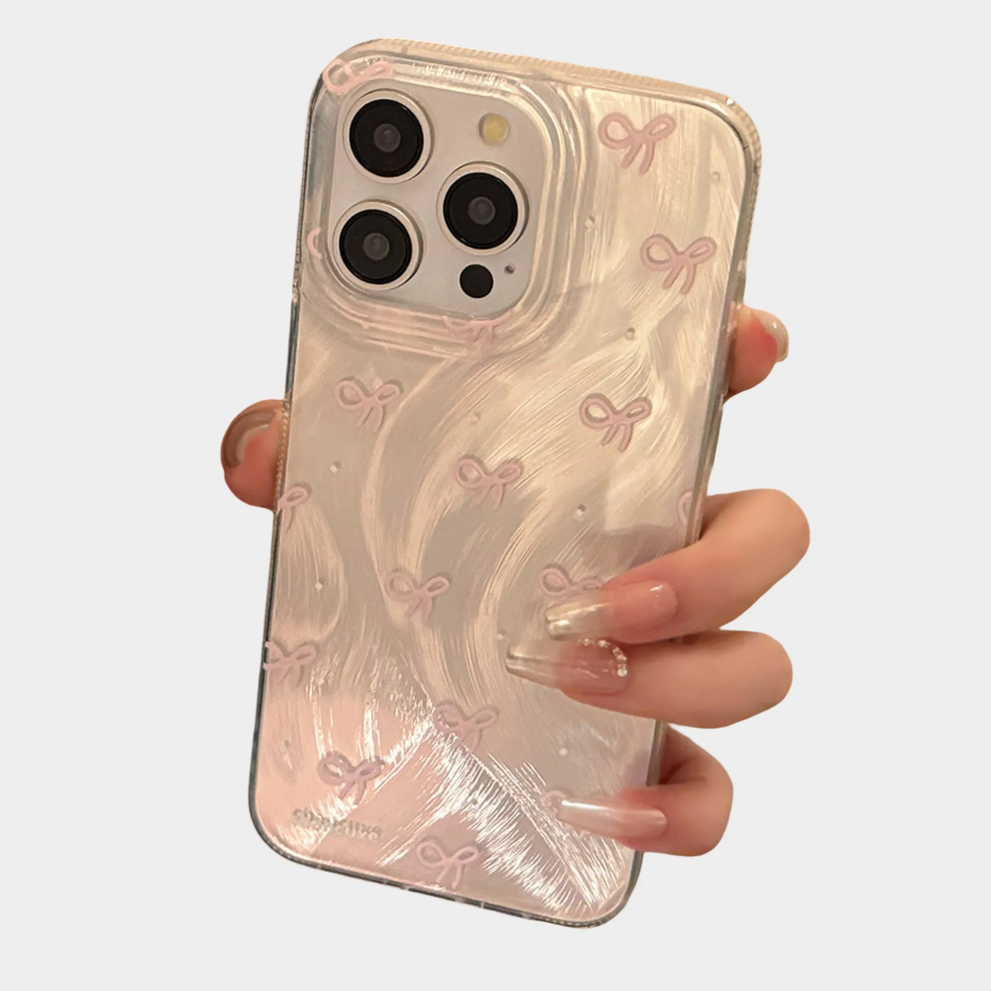 Anna-Kaci Bow Accent Phone Case with Textured Wave Pattern and Raised Bow Details sold by Anna-Kaci product image thumbnail 4