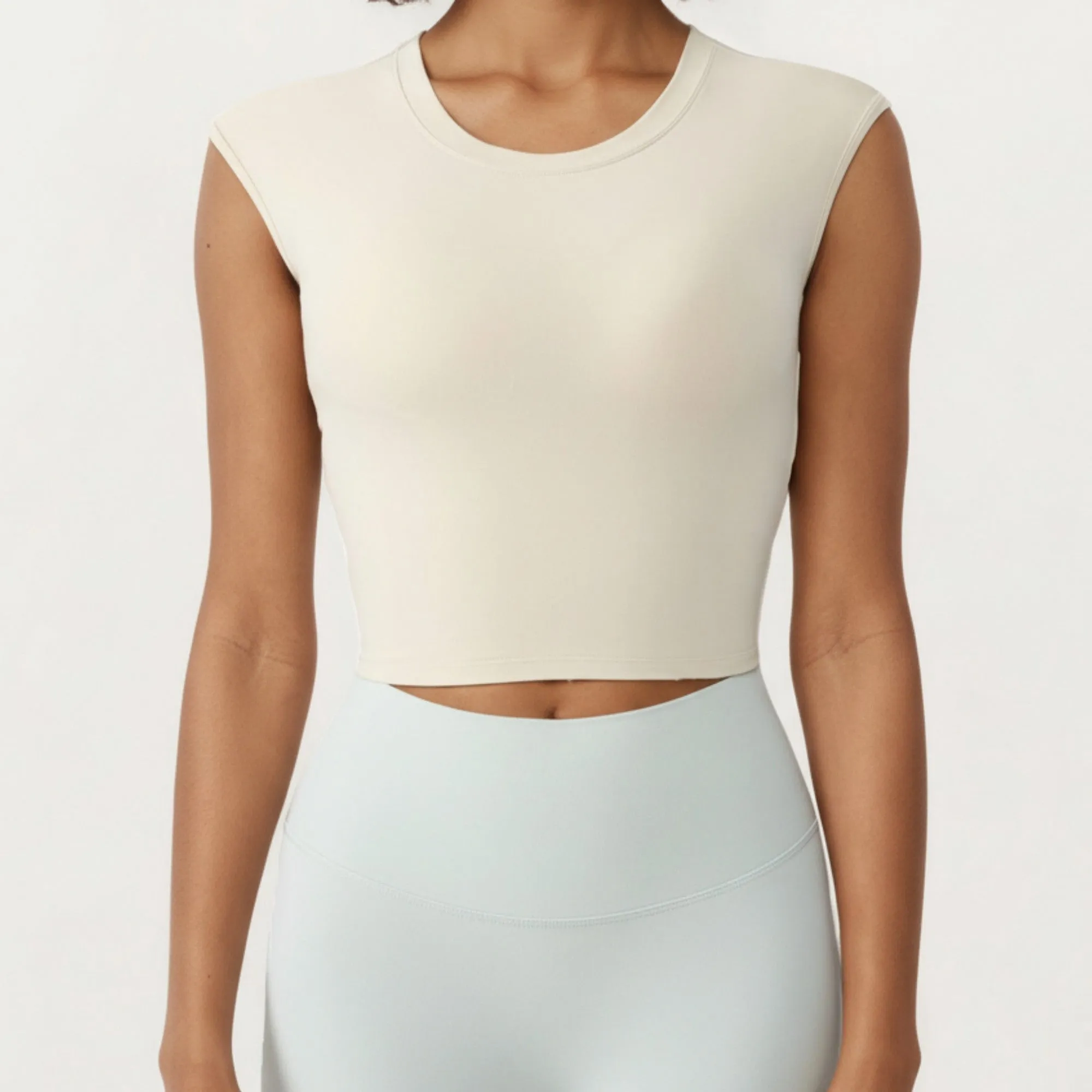 Anna-Kaci Active Women's Sleeveless Cropped Fitted Active Tank Top with Smooth Stretch Fabric and Crew Neckline sold by Anna-Kaci