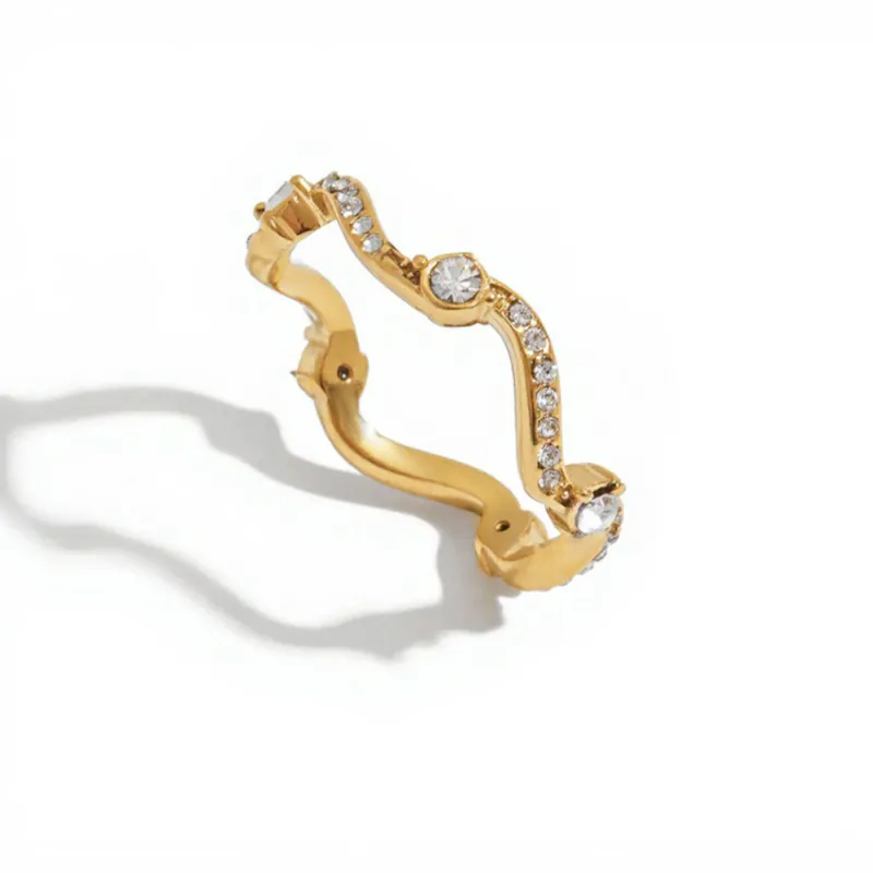 Women's Wavy Band Ring with Delicate Sparkling Accents and Sleek Polished Metal Design made by Anna-Kaci