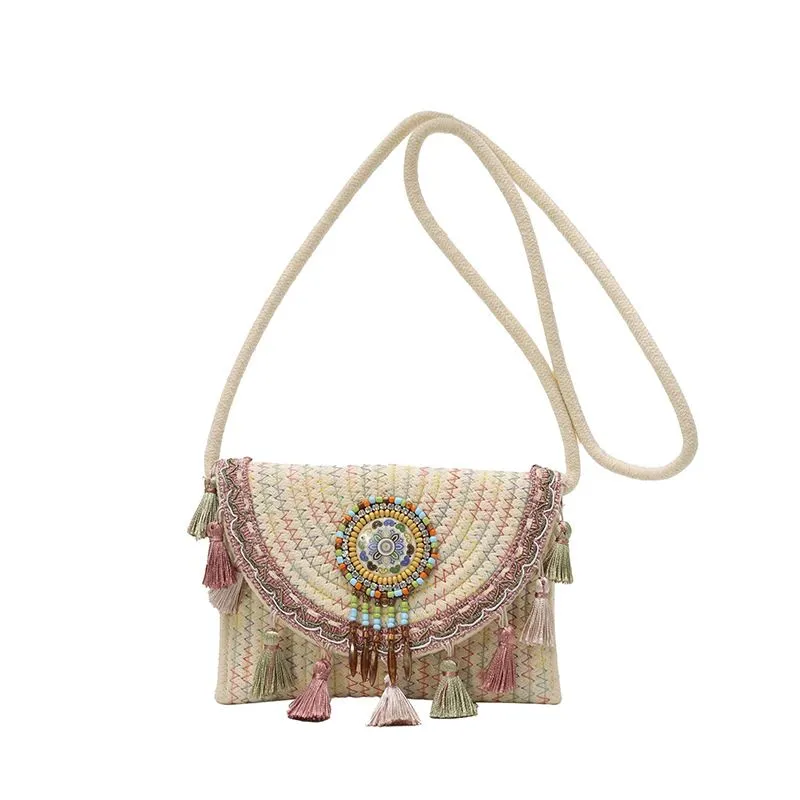 Women's Woven Crossbody Bag with Beaded Medallion Tassel Flap and Long Strap made by Anna-Kaci