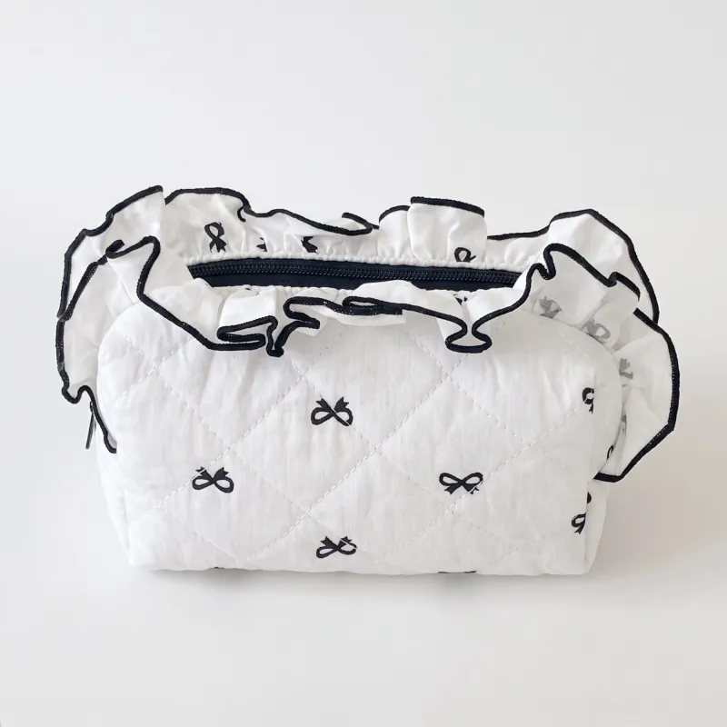 Womens Quilted Bow Print Cosmetic Bag with Ruffle Trim made by Anna-Kaci