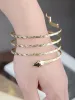 Gold Egyptian Spiral Snake Wrap Around Arm Cuff Coil Bangle Bracelet sold by Anna-Kaci