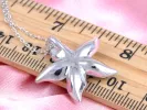 Swarovski Crystal Women's Aquamarine Blue Flower Pendant Necklace With Silver Chain sold by Anna-Kaci