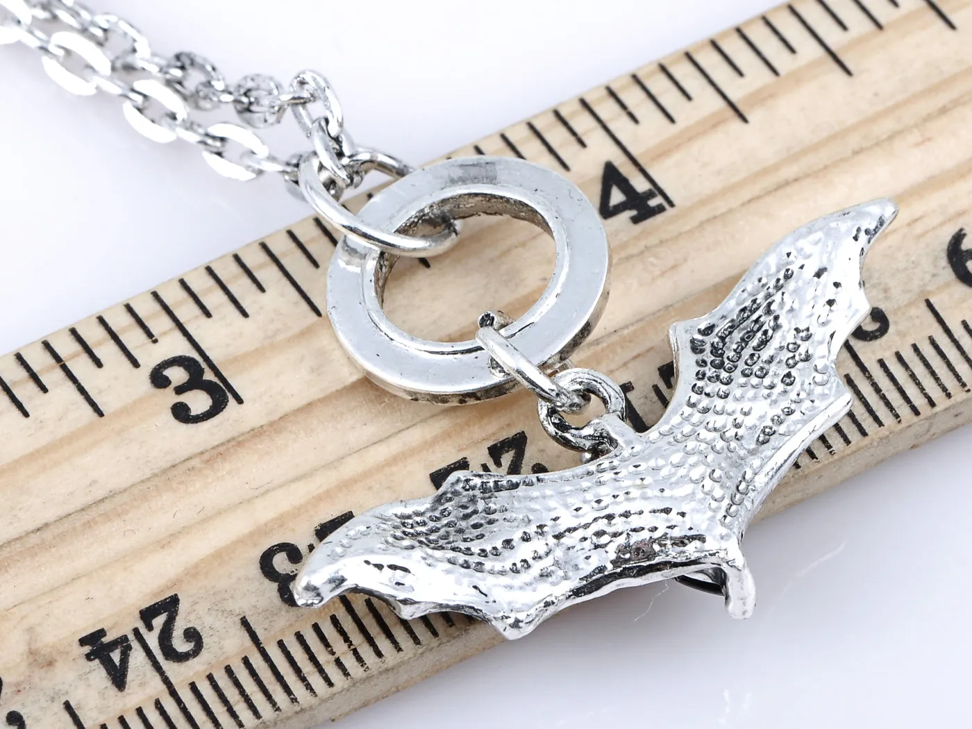 Black Flying Bat Pendant Necklace With Roman Numeral Engravings sold by Anna-Kaci product image thumbnail 3