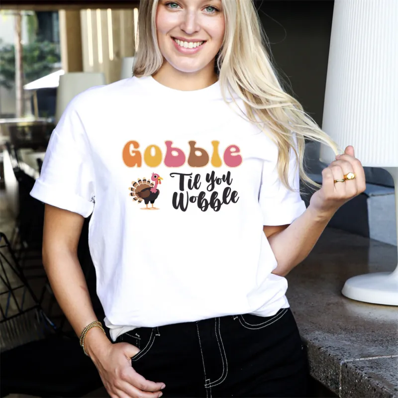 "Gobble 'Til You Wobble" Turkey Feast T-Shirt sold by Anna-Kaci
