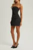 Black strapless a line pocket mini dress sold by Heiress Beverly Hills