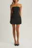 Black strapless a line pocket mini dress sold by Heiress Beverly Hills