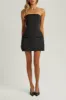 Black strapless a line pocket mini dress sold by Heiress Beverly Hills