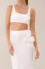 White flower embellished satin crop top sold by Heiress Beverly Hills