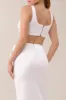 White flower embellished satin crop top sold by Heiress Beverly Hills