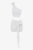 White flower asymmetric crop top sold by Heiress Beverly Hills
