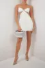 White diamante strap cutout mini dress sold by Heiress Beverly Hills