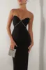 Black diamante strap cutout maxi dress sold by Heiress Beverly Hills