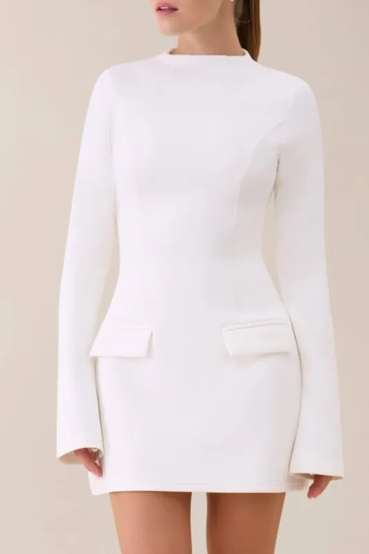 White long sleeve a line pocket mini dress sold by Heiress Beverly Hills