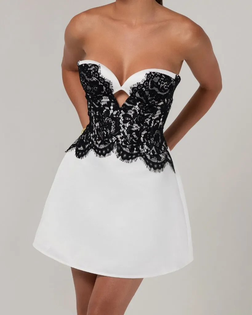 White strapless satin black lace a-line mini dress sold by Heiress Beverly Hills
