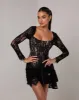 Black long sleeve lace corset draped mini dress sold by Heiress Beverly Hills