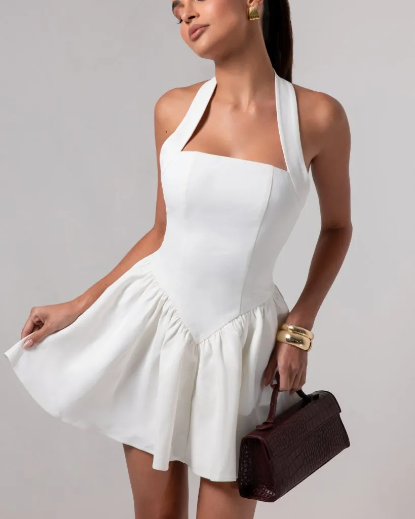 The Contour Halter Mini Dress sold by Heiress Beverly Hills