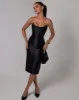 Black strapless sheen corset midi dress sold by Heiress Beverly Hills
