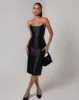 Black strapless sheen corset midi dress sold by Heiress Beverly Hills