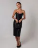 Black strapless sheen corset midi dress sold by Heiress Beverly Hills
