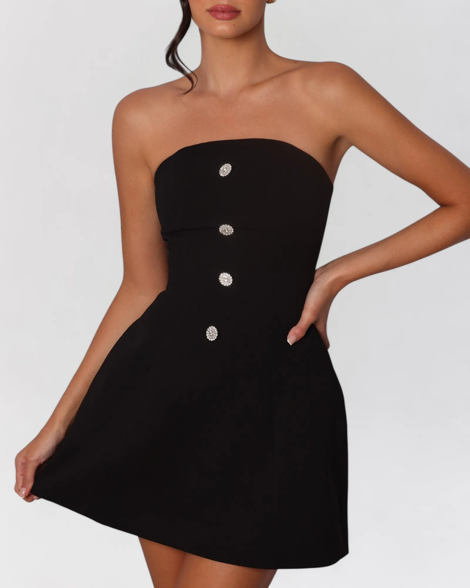 Black crystal button a-line mini dress sold by Heiress Beverly Hills