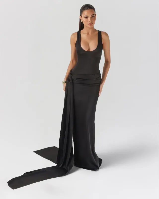 Black low neckline satin sarong maxi dress sold by Heiress Beverly Hills