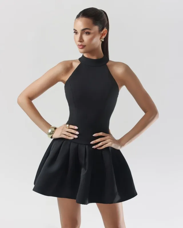 Black crepe high neckline a-line mini dress sold by Heiress Beverly Hills