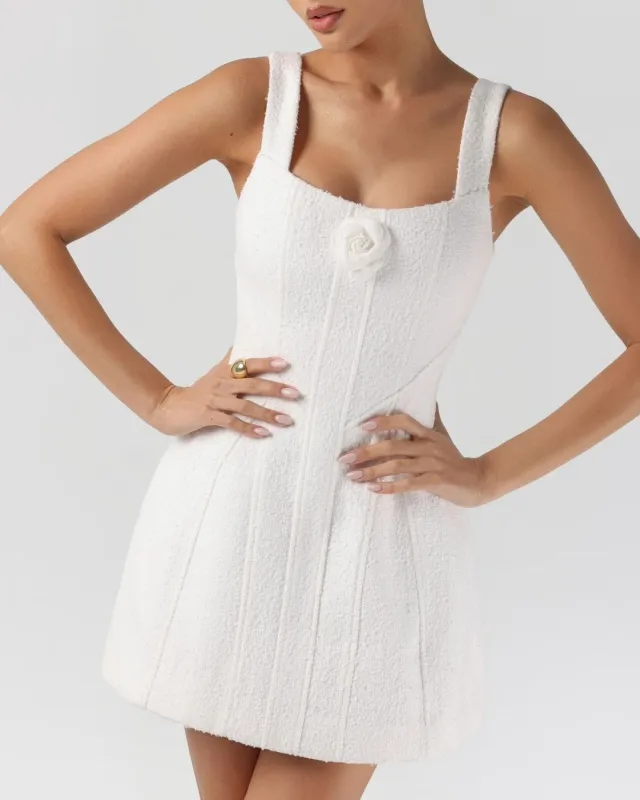 White boucle flower a-line mini dress sold by Heiress Beverly Hills