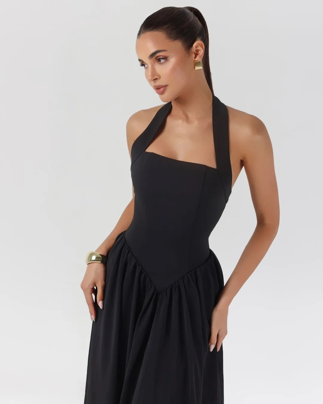 Black halter contour flowy maxi dress sold by Heiress Beverly Hills product image thumbnail 4