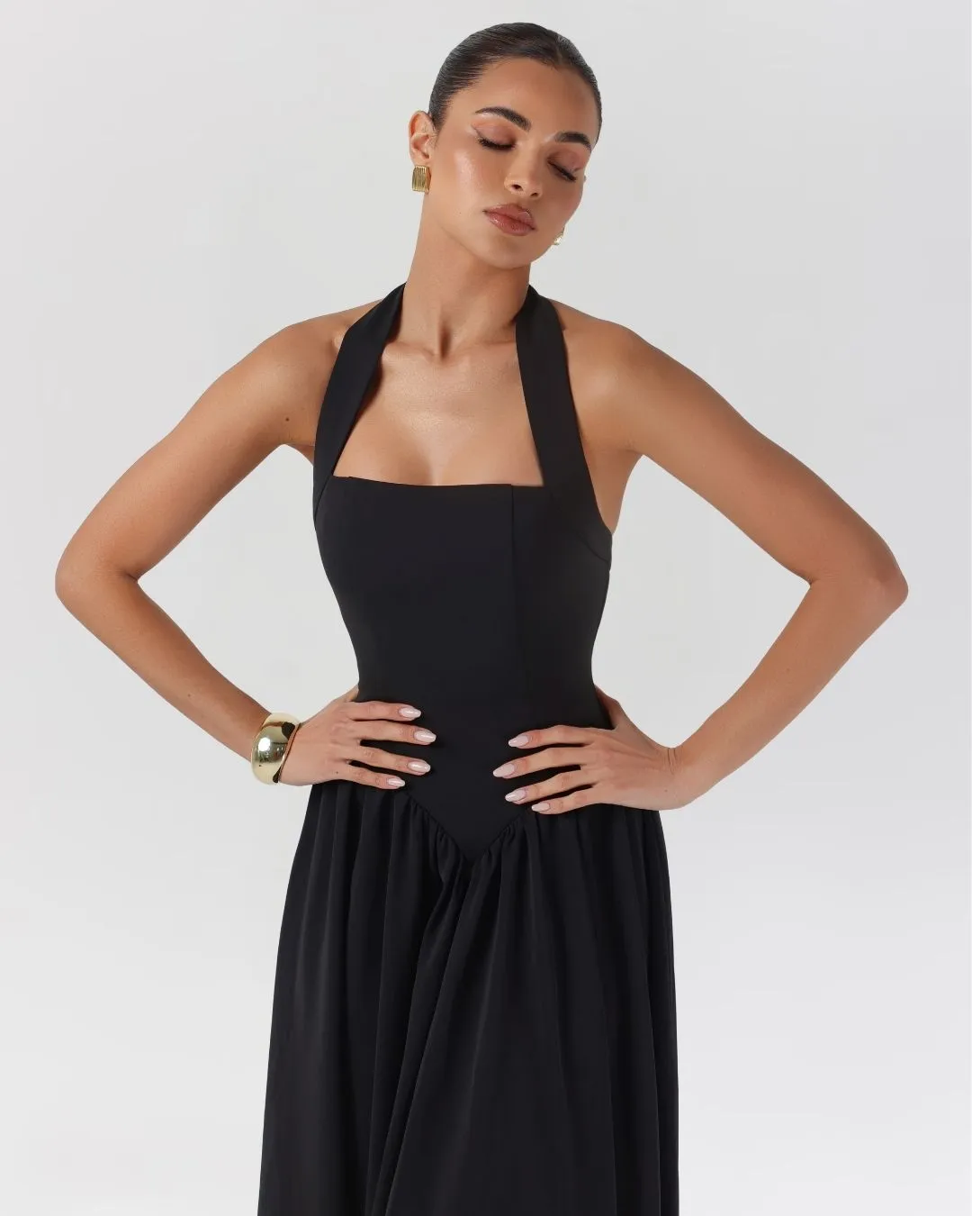 Black halter contour flowy maxi dress sold by Heiress Beverly Hills product image thumbnail 3